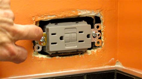 electrical outlet box loose in wall|how to secure loose outlet.